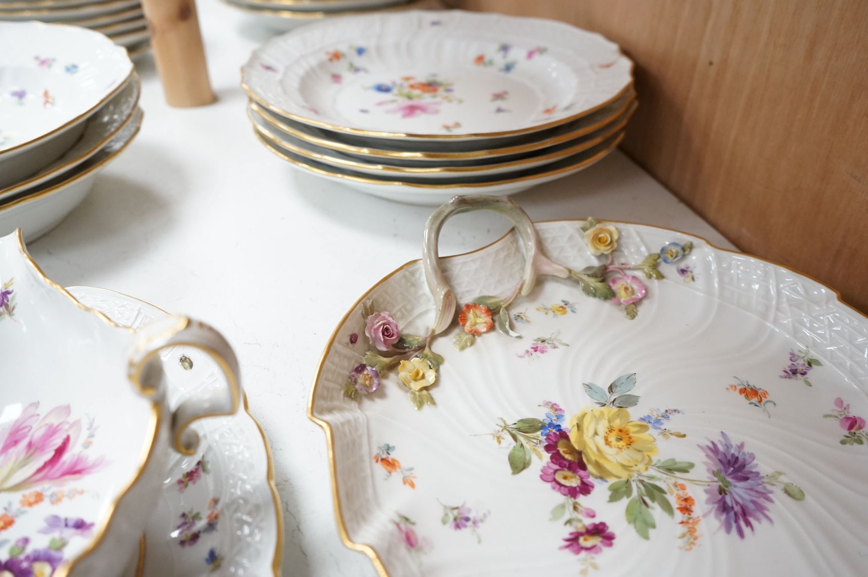 A 19th century Meissen mostly ‘New Brandenstein’ part dinner service. Condition - good